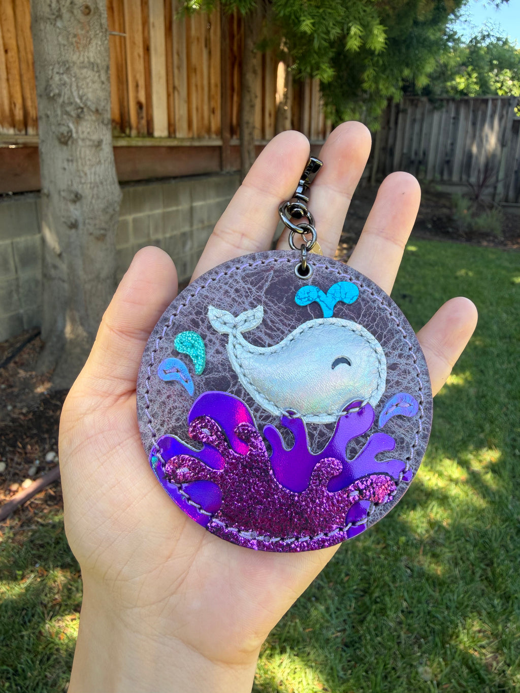 Whimsical ocean splash puffy whale