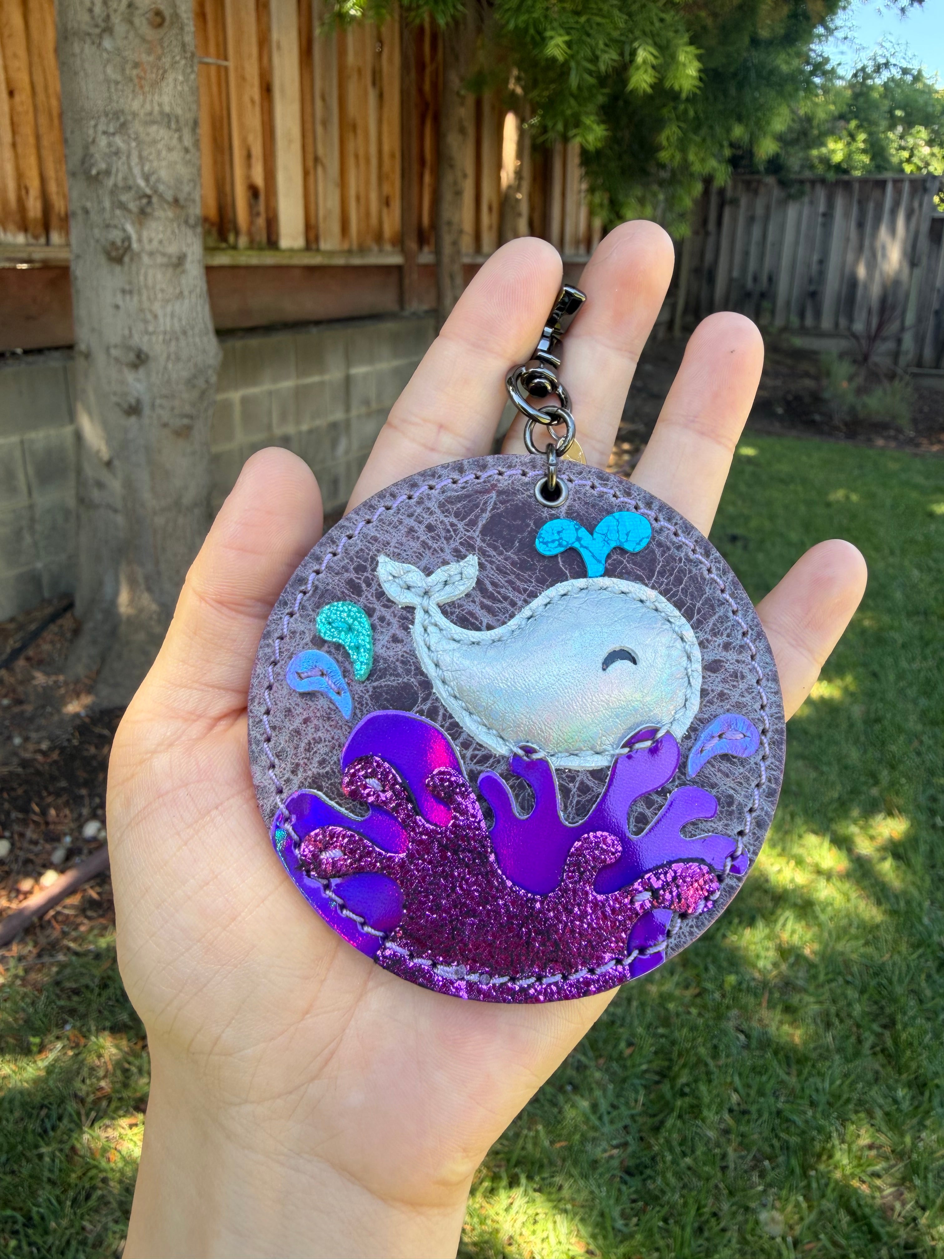 Whimsical ocean splash puffy whale